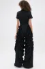 LEAVE IT RUFFLED JUMPSUIT IN BLACK sold by AKIRA