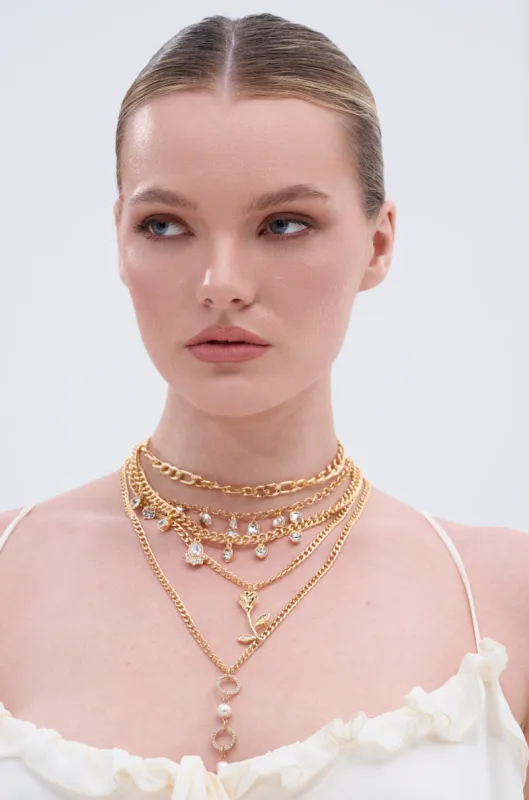 GOING ON A TRIP GOLD NECKLACE SET sold by AKIRA
