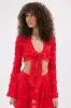 GIMME MORE TIE FRONT SLINKY BLOUSE IN RED sold by AKIRA
