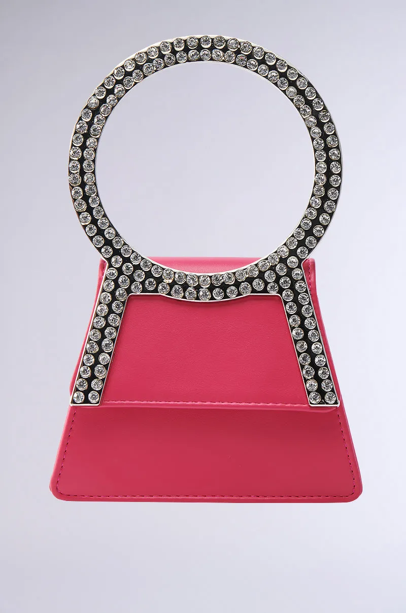 TO THE THRONE PURSE sold by AKIRA