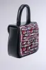 NAILED IT PURSE sold by AKIRA