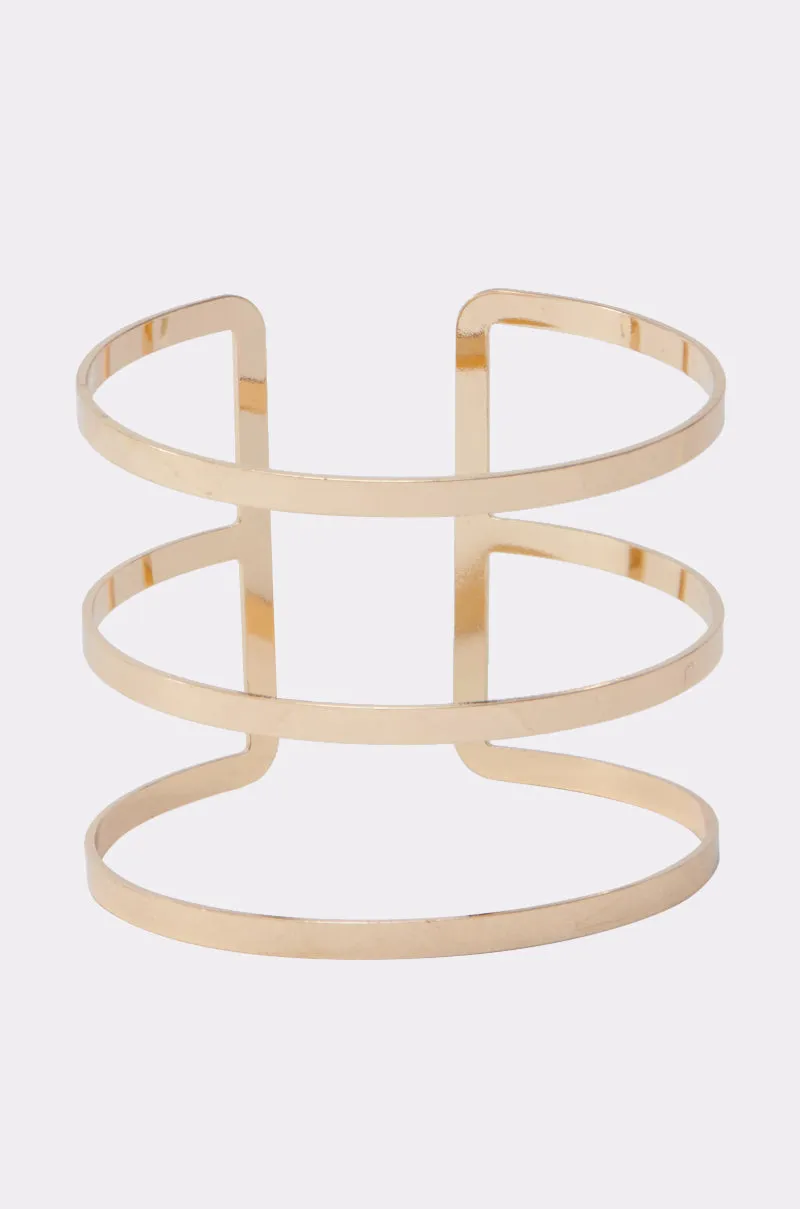 STRICTLY BUSINESS ARM CUFF sold by AKIRA