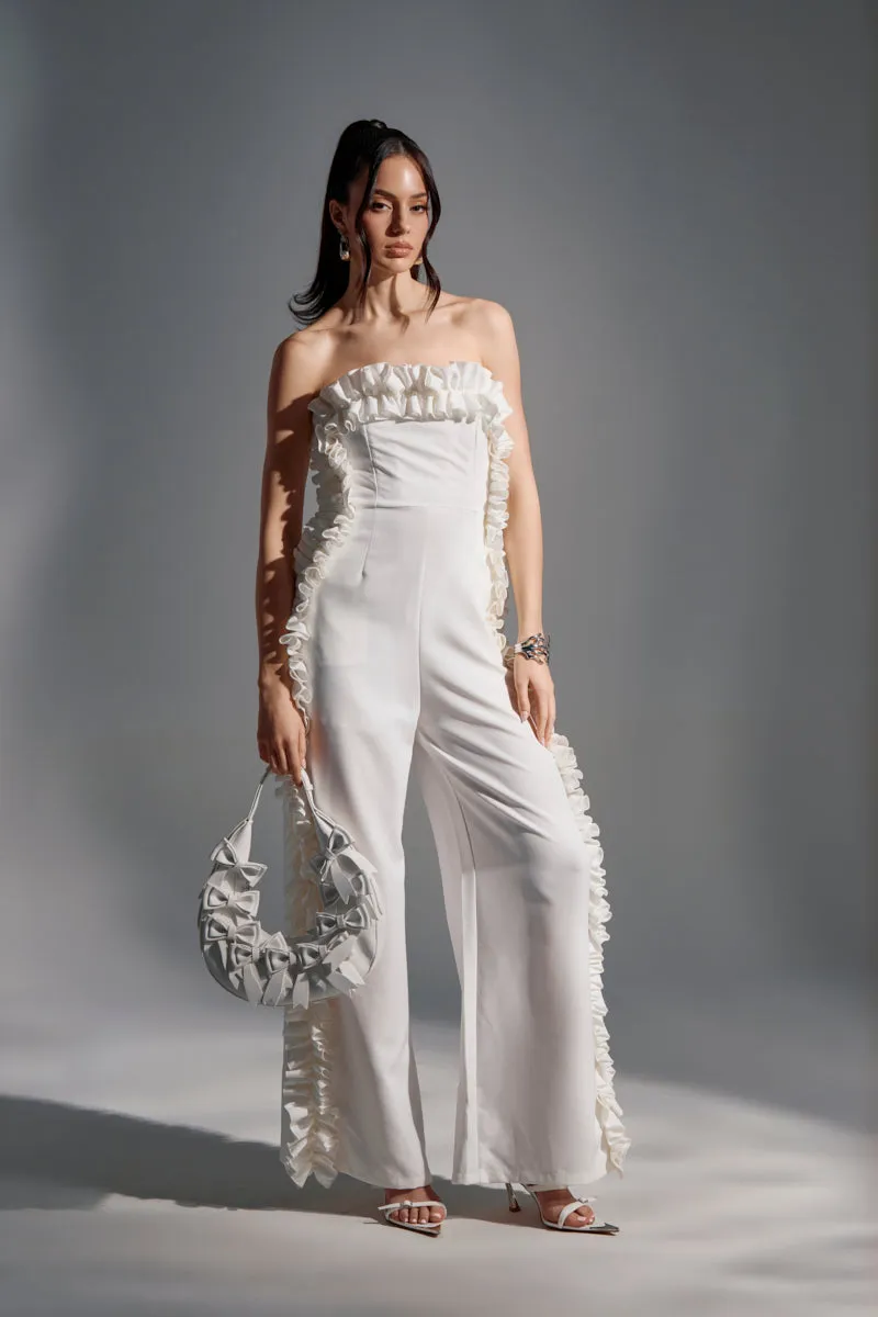 MONICA RUFFLED JUMPSUIT IN WHITE sold by AKIRA