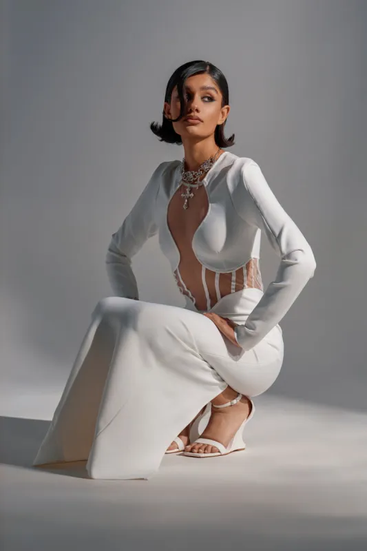 A NIGHT OUT BANDAGE MAXI DRESS IN WHITE sold by AKIRA