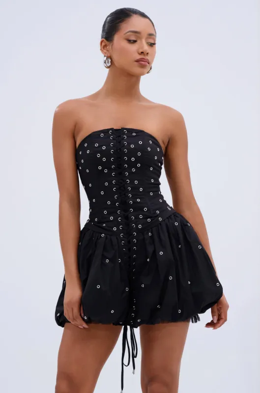 ON THE EDGE BUBBLE MINI DRESS WITH GROMMETS sold by AKIRA
