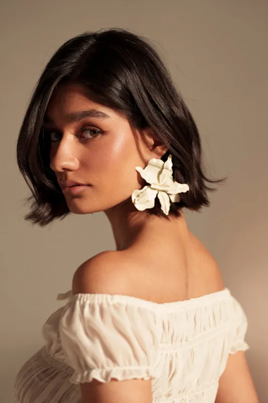 NEVER SETTLE EARRING sold by AKIRA