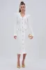 SAKURA BANDAGE RUFFLE MIDI DRESS IN WHITE sold by AKIRA