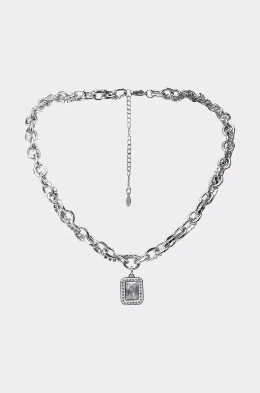 SHES EXPENSIVE SILVER NECKLACE sold by AKIRA