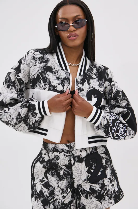 PAINT THE ROSES RED JACQUARD BOMBER sold by AKIRA
