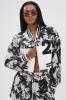 PAINT THE ROSES RED JACQUARD BOMBER sold by AKIRA