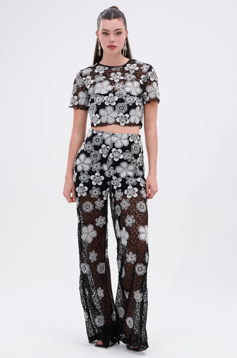 FLORAL SEQUIN MESH PANT sold by AKIRA