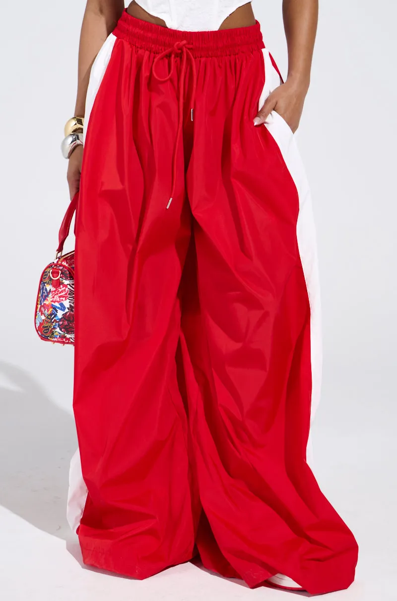 BREAKING THE RULES TRACK PANT sold by AKIRA