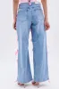 PRETTY IN PINK BOW DETAIL DENIM JEANS sold by AKIRA