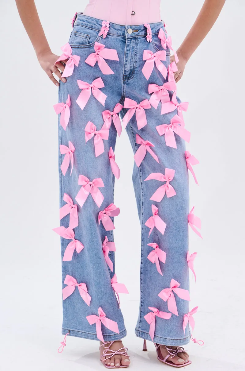 PRETTY IN PINK BOW DETAIL DENIM JEANS sold by AKIRA product image thumbnail 3