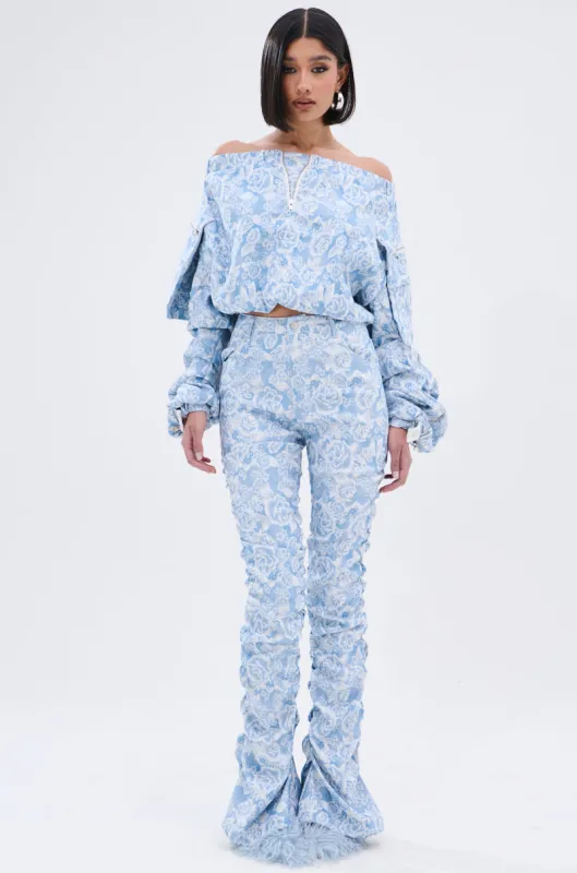 FLORAL LIFE DENIM STACKED PANT sold by AKIRA