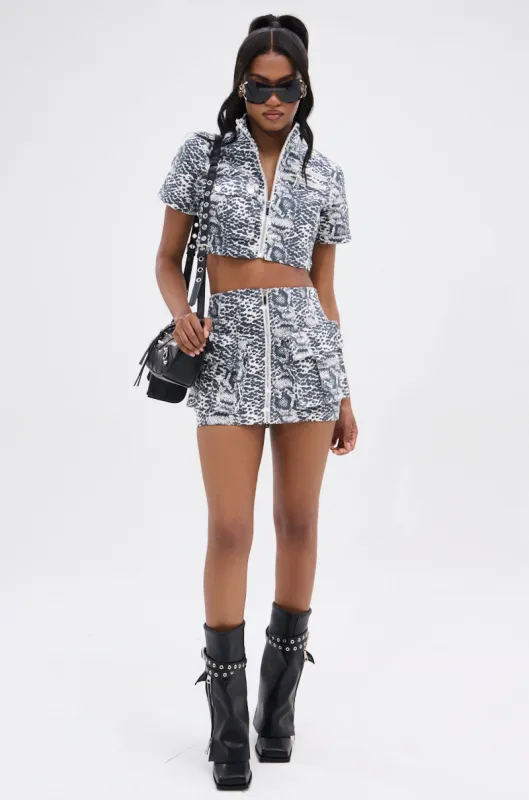 COLD BLOODED MINI SKIRT sold by AKIRA