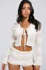 FREE OF LOVE TIE-FRONT TOP sold by AKIRA