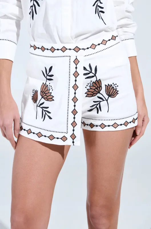 EMBROIDERED FLOWER LINEN SKORT sold by AKIRA