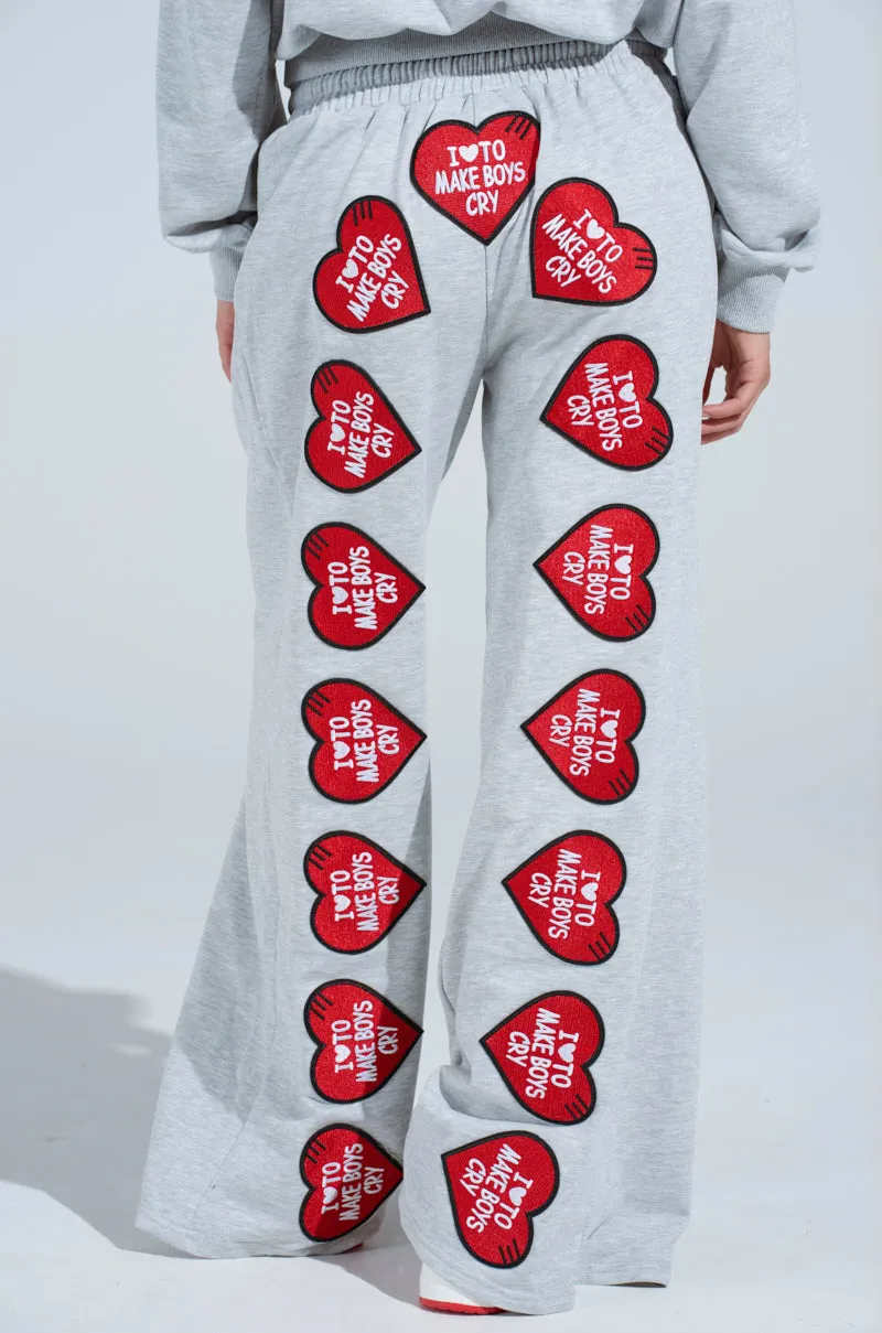 I LOVE TO MAKE BOYS CRY WIDE LEG SWEATPANT sold by AKIRA