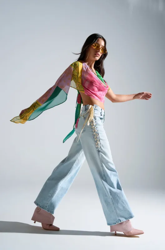 COME HANG WITH ME WIDE LEG DENIM PANT WITH TIES sold by AKIRA