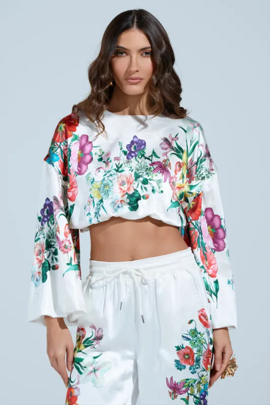 FULL BLOOM ZIP OFF SLEEVES BLOUSE sold by AKIRA