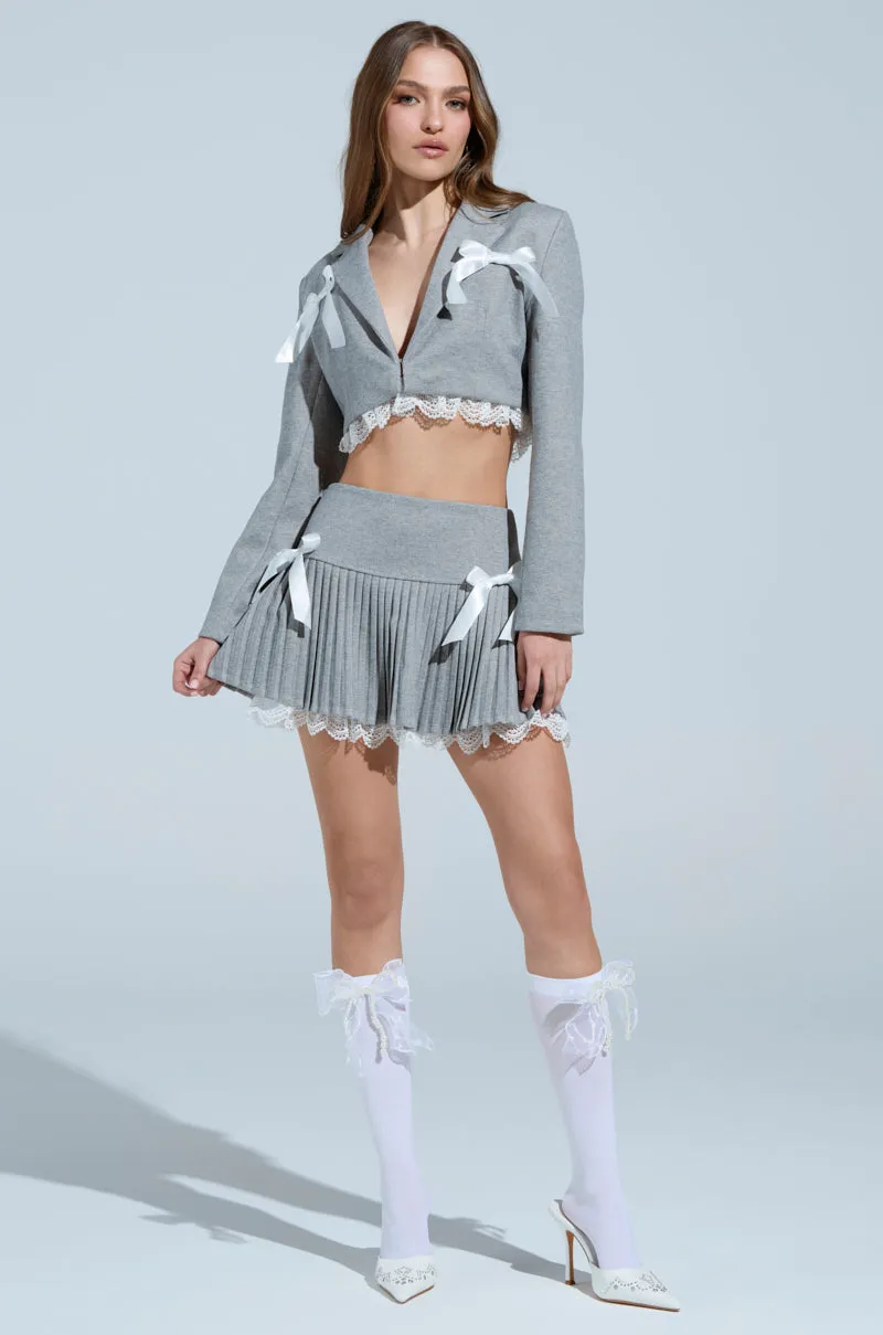 MARLEY LACE TRIM MINI SKIRT sold by AKIRA