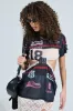 GIRL BOSS MOMENTS BLACK MULTI CUT OUT TSHIRT sold by AKIRA