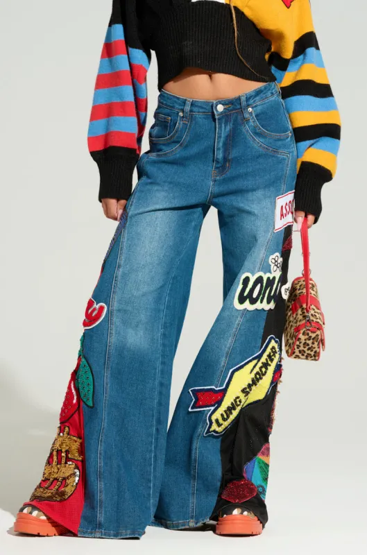 NOT SORRY PATCHWORK DENIM JEANS sold by AKIRA