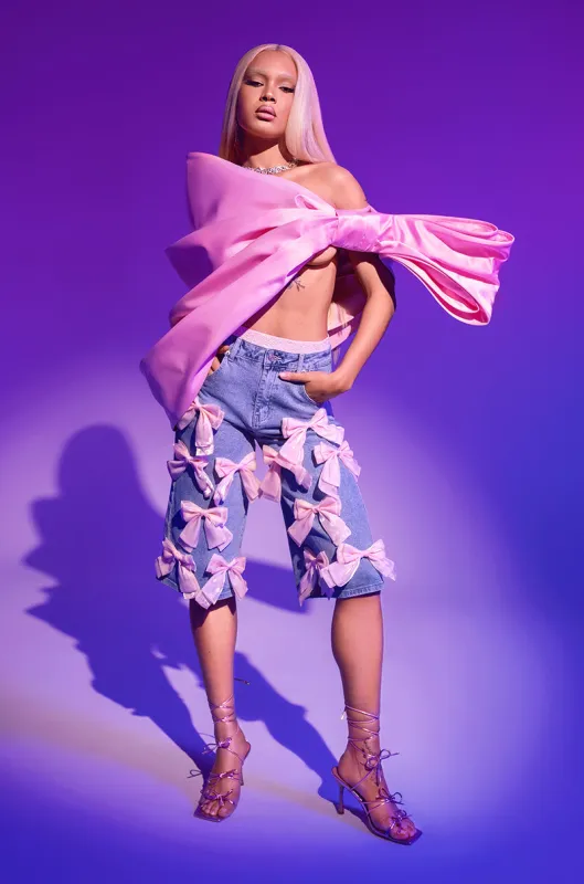 BOWS ALL OVER DENIM BERMUDA SHORT sold by AKIRA