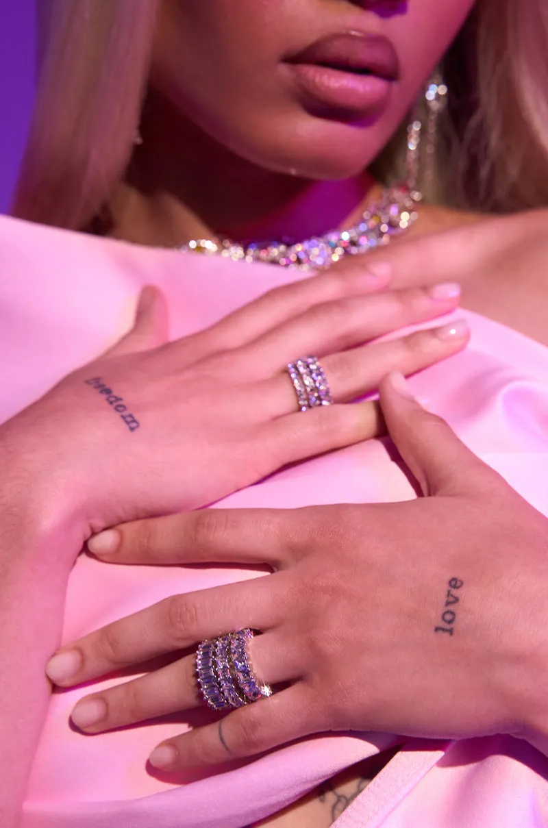 SPEND IT RHINESTONE RING SET sold by AKIRA