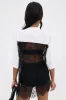 IT GIRL LACE JERSEY DRESS IN WHITE AND BLACK sold by AKIRA