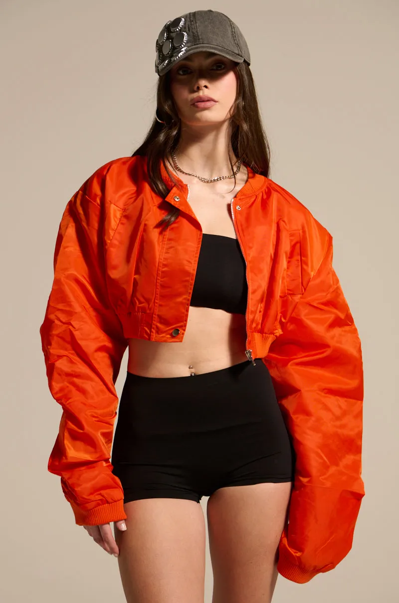 TAKE IT EASY CROPPED BOMBER IN ORANGE sold by AKIRA