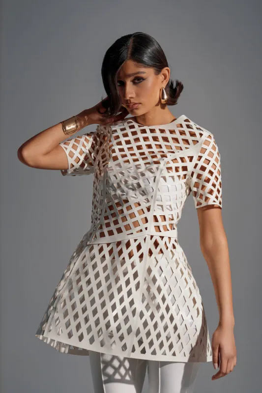 SHE'S DIFFERENT CUT OUT FAUX LEATHER MINI DRESS IN WHITE sold by AKIRA