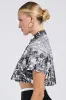 ALL AROUND THE WORLD BUTTON DOWN TOP sold by AKIRA