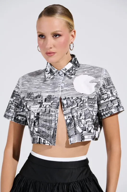 ALL AROUND THE WORLD BUTTON DOWN TOP sold by AKIRA