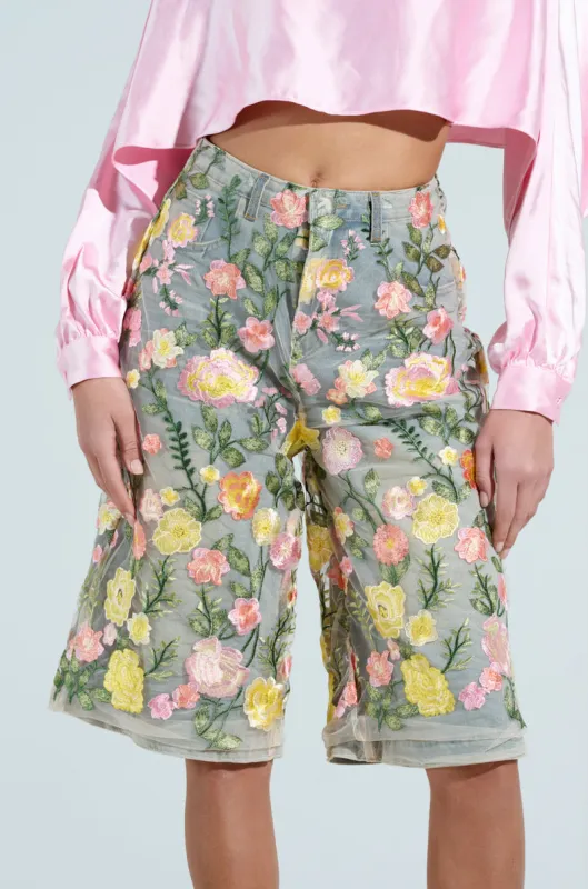 GARDEN PARTY STRETCH DENIM WITH FLORAL TULLE BERMUDA SHORTS sold by AKIRA