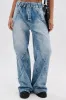 TIED TO YOU RELAXED DENIM PANT WITH TIE BELT sold by AKIRA
