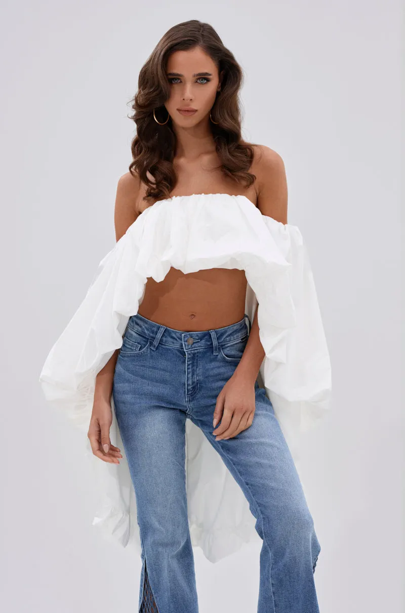 MELANI OFF THE SHOULDER HIGH LOW BLOUSE sold by AKIRA