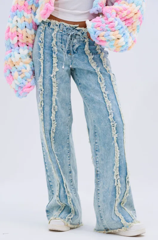 EILEEN DISTRESSED LACE UP WIDE LEG JEAN sold by AKIRA