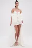 SHE IS THE MOMENT MINI DRESS WITH TRAIN IN WHITE sold by AKIRA