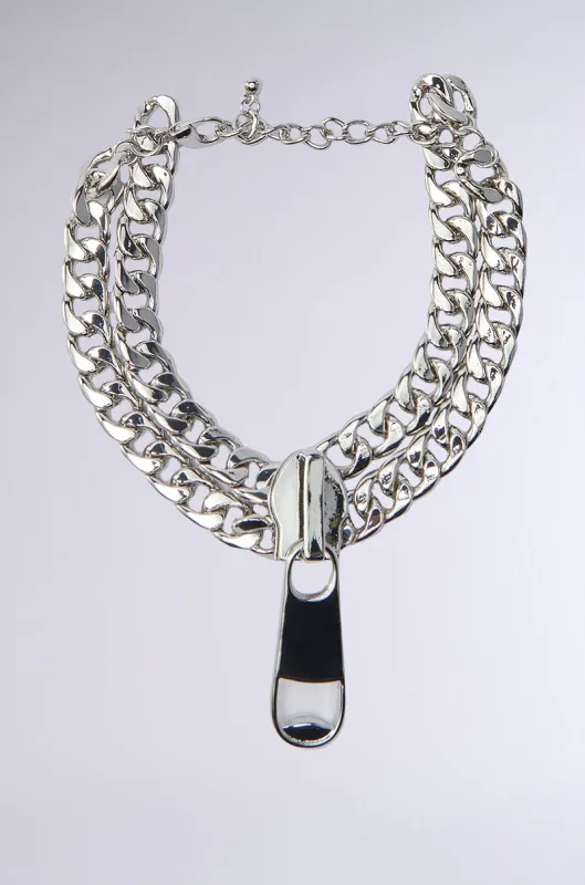 ZIP IT ANKLET sold by AKIRA