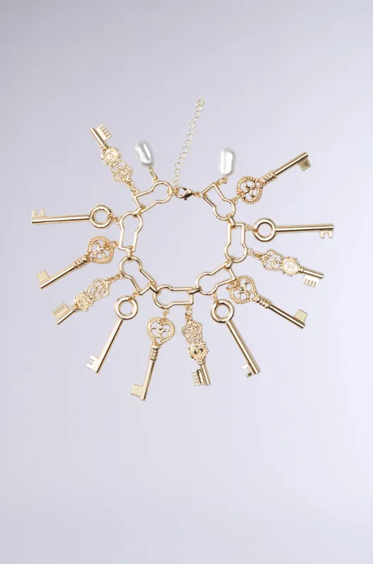ALL THE KEYS CHARM BRACELET sold by AKIRA