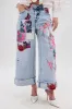 PICTURE PERFECT PATCHWORK DENIM JEANS sold by AKIRA
