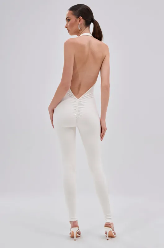 KEEP IT CASUAL HALTER JUMPSUIT IN WHITE sold by AKIRA