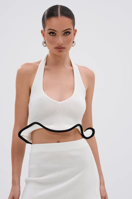 CUTIE PIE RUFFLE HEM BLOUSE sold by AKIRA