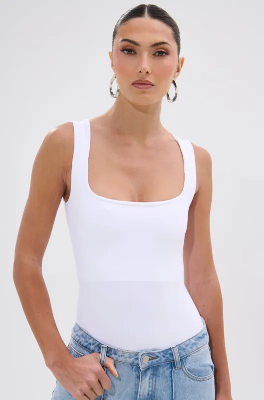 NEW STANDARD SQUARE NECK SLEEVELESS BODYSUIT IN WHITE sold by AKIRA