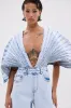 BORN TO STAND OUT DENIM JUMPSUIT sold by AKIRA