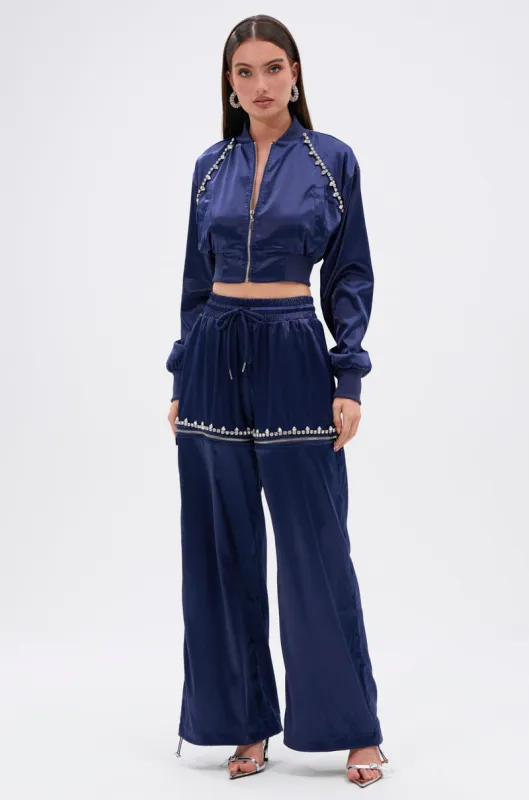 CALL BACK CUTOUT SATIN JOGGER sold by AKIRA