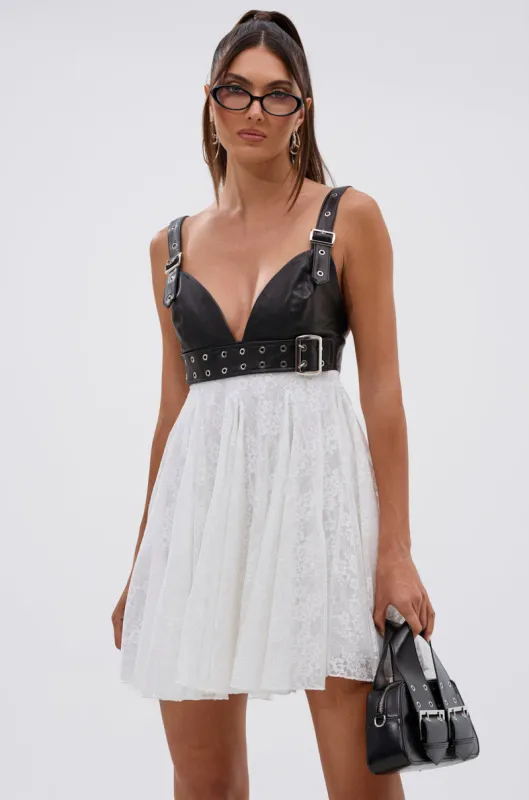 EDGY WITH A BOW ON TOP MINI DRESS sold by AKIRA