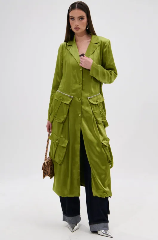 OUTTA TIME SATIN CARGO TRENCH sold by AKIRA